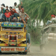 Illustration for article titled Incredible Ways People Deal with Overloaded Transit Systems in Asia